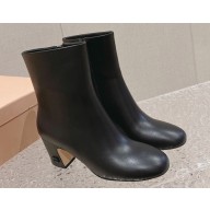 Miu Miu Leather booties 5T020E Black 2024