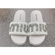 Miu Miu Matelassé Satin slides White with Crystal Logo 2024