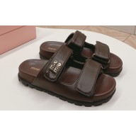 Miu Miu nappa leather slides 5XX640 Coffee 2024
