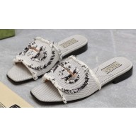 Gucci Women's Interlocking G slide sandals 782412 in canvas Gray 2024