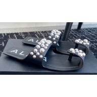 Alaia Folded Flat Mules With Spheres On Calfskin Black 2024