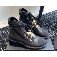 Chanel Calfskin, Grosgrain, Imitation Pearls, Strass & Metal Combat Boots G45856 Black 2024