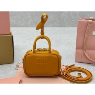 Miu Miu Leather micro bag 5NR036 Cognac 2024