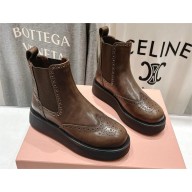 Miu Miu Brushed calf leather booties 5T268E sienna 2024