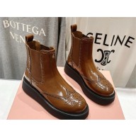 Miu Miu Brushed calf leather booties 5T268E brown 2024