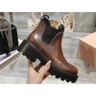 Miu Miu calf leather booties 5T296E sienna 2024