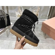 Miu Miu Shearling boots 5U862D black 2024