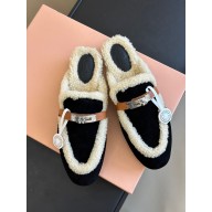 hermes shearling kelly mules in suede calfskin black 2023