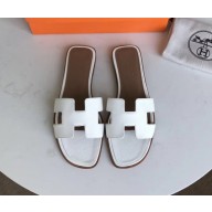 Hermes Oran Flat slippers in epsom leather white/brown