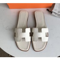 Hermes Oran Flat slippers in epsom leather off white with brown piping