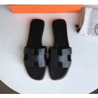 Hermes Oran Flat slippers in epsom leather black with brown piping