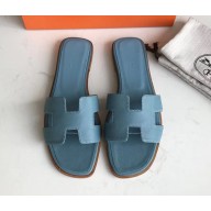 Hermes Oran Flat slippers in epsom leather blue jean with brown piping
