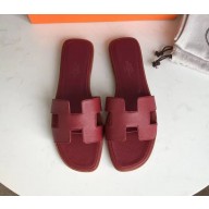 Hermes Oran Flat slippers in epsom leather burgundy with brown piping