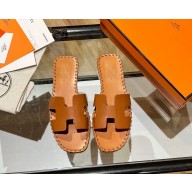 hermes oran sandal in braided calfskin tan