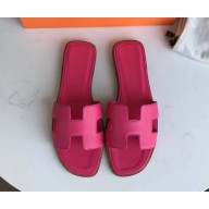 Hermes Oran Flat slippers in epsom leather rosy with brown piping