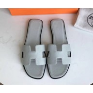 Hermes Oran Flat slippers in epsom leather blue lin with black piping