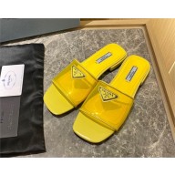 Prada logo-detailed PVC mules yellow 2022