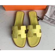 Hermes Oran Flat slippers in epsom leather lemon yellow with brown piping