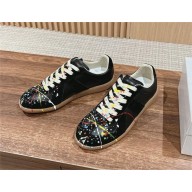 Maison Margiela Replica Paint Splatter Leather Sneakers in black 2024