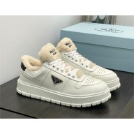 Prada Leather and shearling sneakers 1E947M white 2023