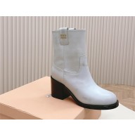 Miu Miu Fumé leather booties white 2023