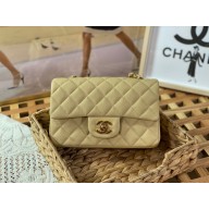 Chanel Mini Classic Flap Handbag A69900 in caviar leather light yellow with gold hardware