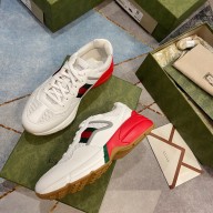 Gucci lover's Rhyton sneaker with black and red web 643491 2021