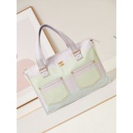 CHANEL Printed Denim & Gold-Tone Metal Light Pink, Light Yellow & Light Blue Shopping Bag AS4719 2024