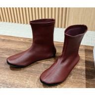 The Row Elastic sheepskin ankle boots in burgundy 2024