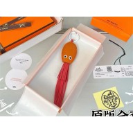 hermes poulple key ring orange/red 2025