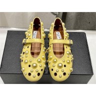 Alaia BALLET FLATS WITH SPHERES ON LAMBSKIN yellow 2024