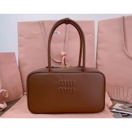 Miu Miu Beau leather top-handle bag 5BB172 Caramel 2024