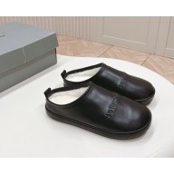 Balenciaga women's calfskin mules with shearling in black 2024