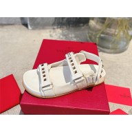 Valentino ROCKSTUD FLAT SANDAL IN NAPPA LEATHER white 2023