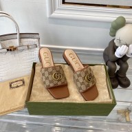 gucci Women's GG matelassé canvas slide sandal tan 2021
