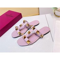 VALENTINO ROMAN STUD FLAT CALFSKIN SLIDE SANDAL LIGHT PINK 2023