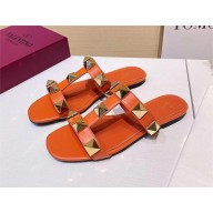 VALENTINO ROMAN STUD FLAT CALFSKIN SLIDE SANDAL ORANGE 2023