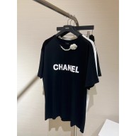 chanel black T-SHIRT with a camellia necklace 2023