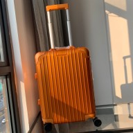 rimowa suitcase orange 2022