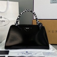 Prada X Raf Simons Cowhide handbag in Black Pb022