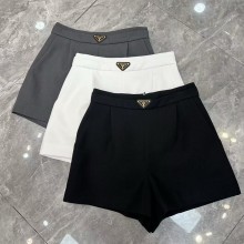 Prada shorts with metal triangle logo 2025