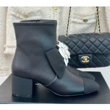 Chanel Camellia lambskin ankle boots in black heel 6cm 2024