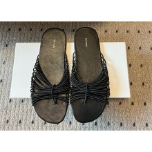 The Row sara slides in black 2025