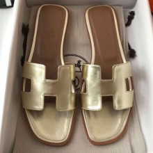 Hermes Oran Flat Slipper Sandals in Metallic Leather Gold