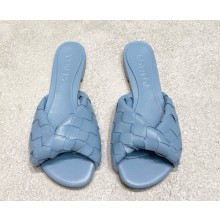 Bottega Veneta Blink Flat Mule with a folded detail in Intrecciato laminated leather light blue 2025