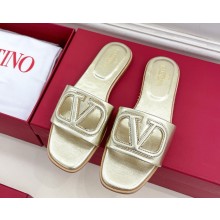 VALENTINO GARAVANI VLOGO cut-out calfskin flat slides gold 2025