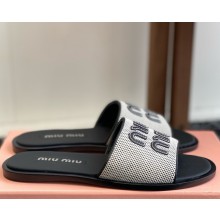 Miu Miu Canvas and leather slides Beige/black 5XX644 2025