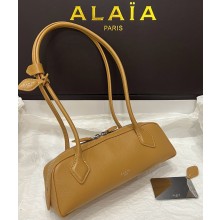 Alaïa LE TECKEL SMALL shoulder BAG IN LEATHER light yellow 2025