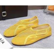 Alaïa SLIPPERS IN FISHNET OPTIC yellow 2025