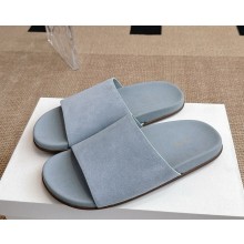 The Row Hugh Slide in Suede sky blue 2025